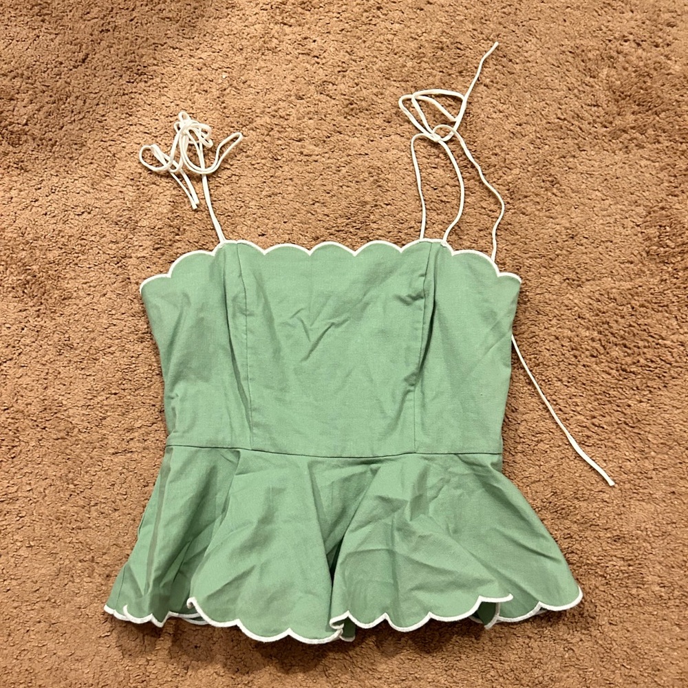 Green peplum top